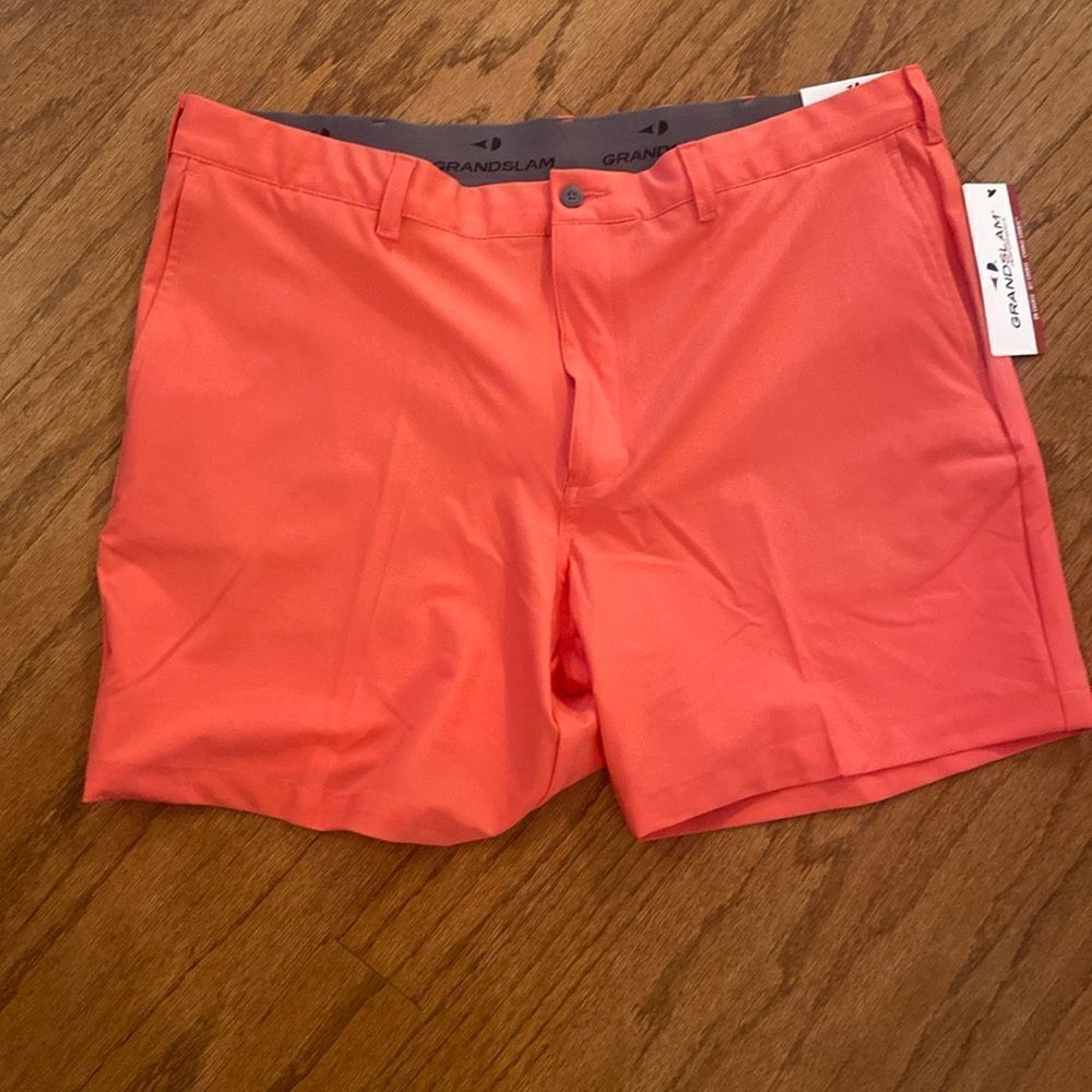 NWT GrandSlam coral colored shorts, size 40 waist, 7 inch inseam, stretch waist